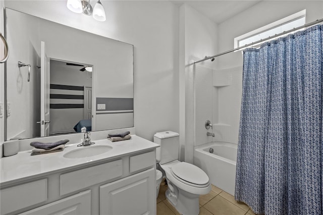 full bathroom with vanity, toilet, tile patterned flooring, and shower / bath combo with shower curtain