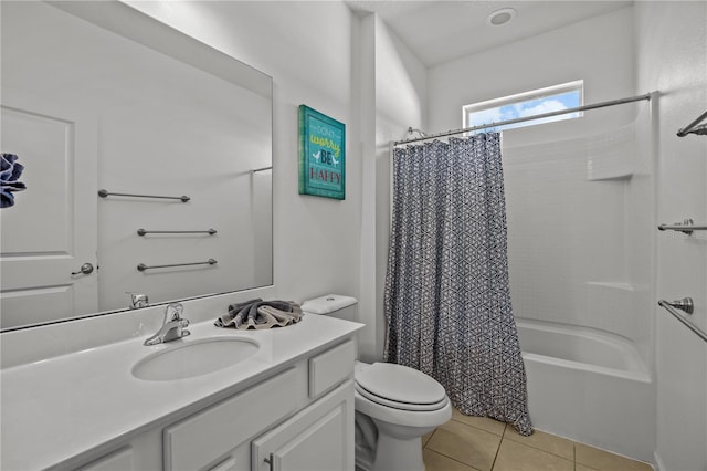 full bathroom with vanity, shower / tub combo with curtain, tile patterned floors, and toilet