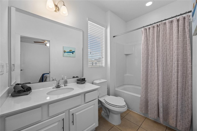 full bathroom featuring shower / tub combo, vanity, tile patterned floors, and toilet