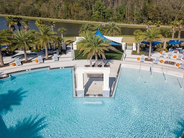 view of pool featuring a patio