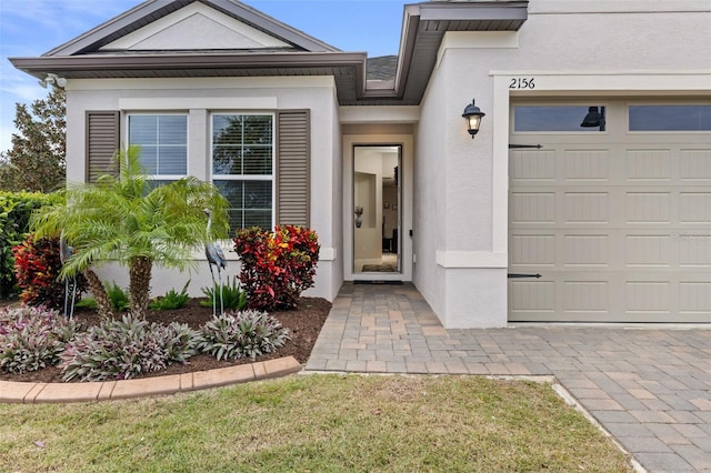 property entrance with a garage