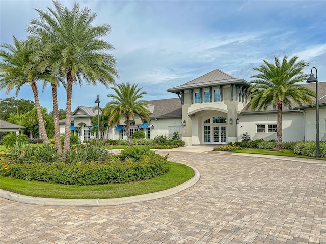 view of property featuring french doors