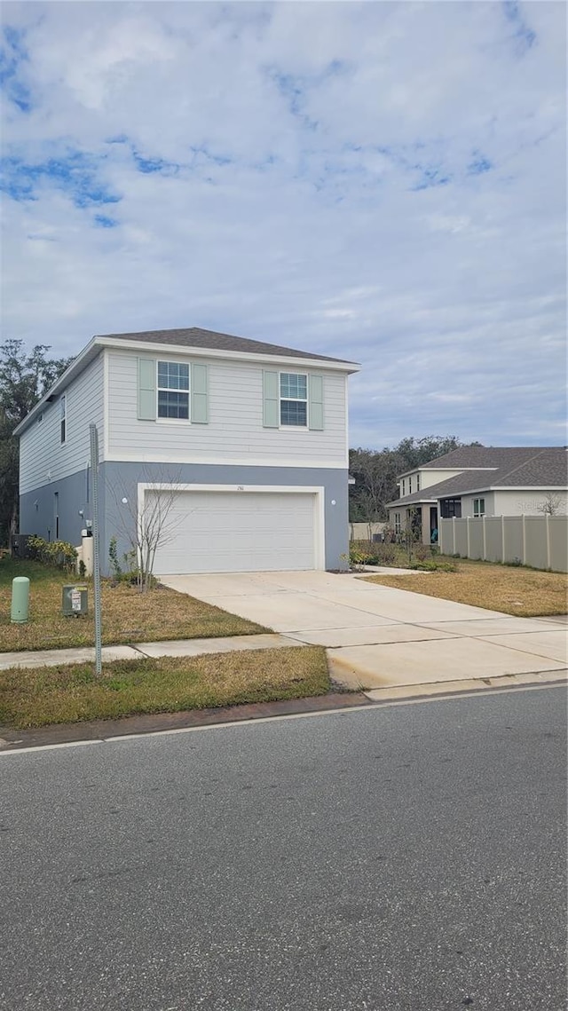 view of front of property featuring a garage