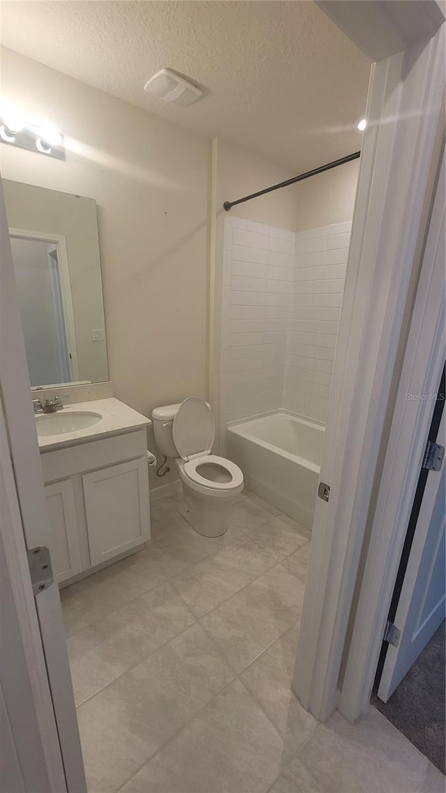 full bathroom featuring a textured ceiling, shower / bathtub combination, vanity, and toilet