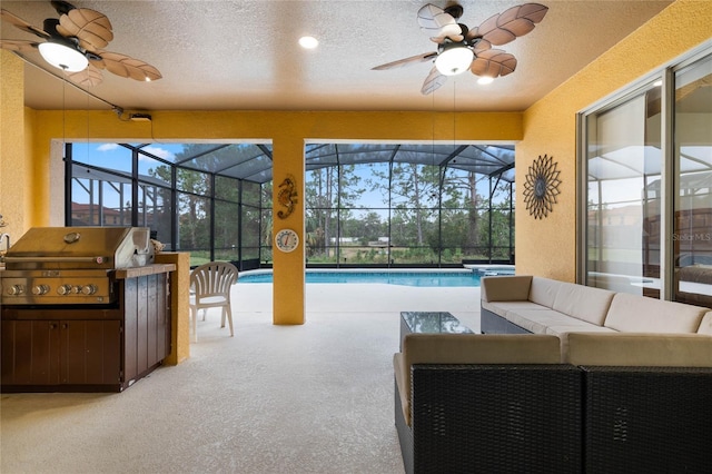 carpeted living room with a textured ceiling and ceiling fan