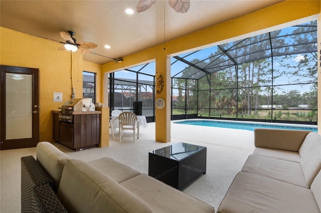 interior space featuring ceiling fan and a textured ceiling