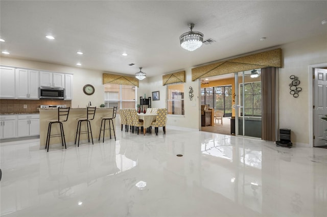 dining area featuring a chandelier