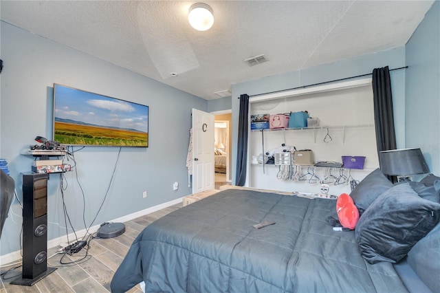 bedroom with a textured ceiling