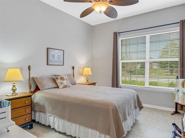 bedroom featuring ceiling fan and light tile patterned flooring