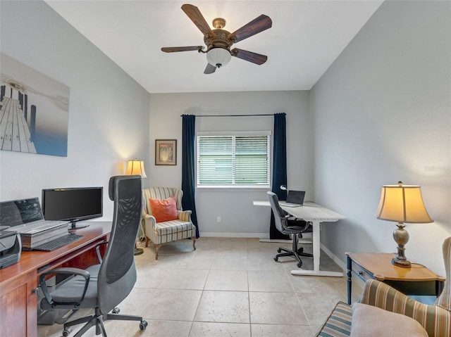 office space featuring ceiling fan and light tile patterned floors