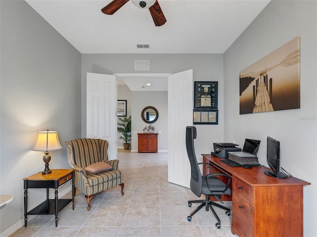 tiled home office with ceiling fan