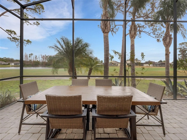 sunroom with a water view