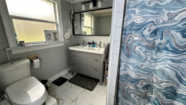 bathroom featuring toilet, curtained shower, ornamental molding, and vanity