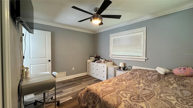 bedroom featuring dark wood-type flooring, ceiling fan, and crown molding