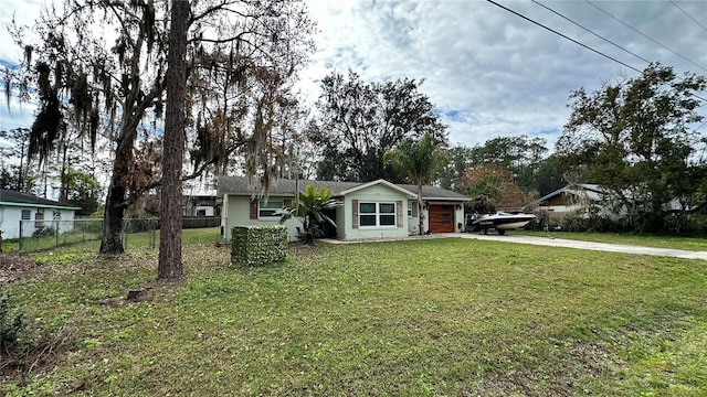 ranch-style home featuring a front lawn