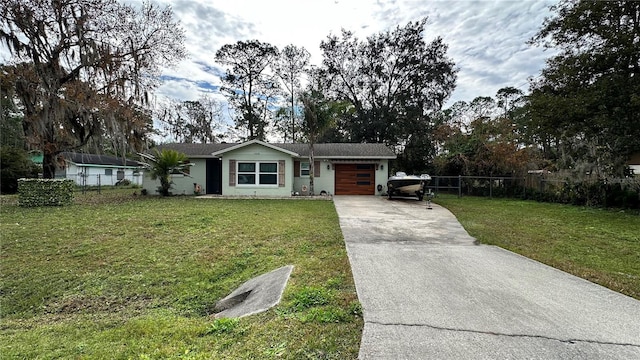 ranch-style house with a front yard and a garage