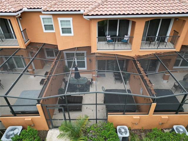 view of building exterior featuring central air condition unit