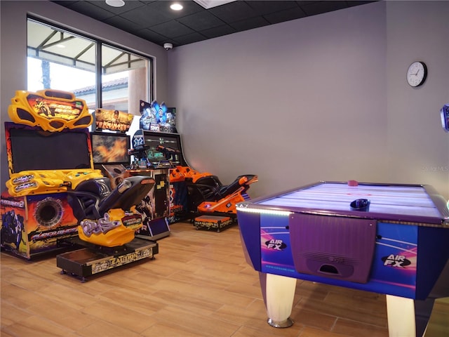 playroom with light hardwood / wood-style floors