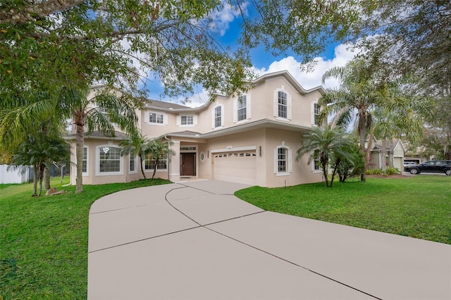 view of front facade with a front lawn and a garage