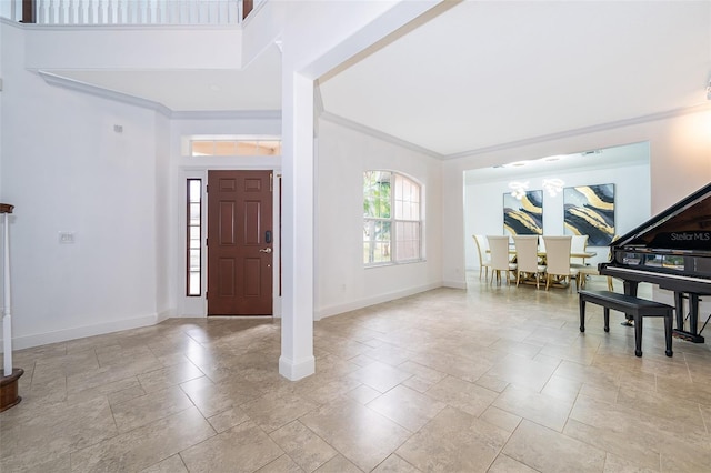 entrance foyer with ornamental molding