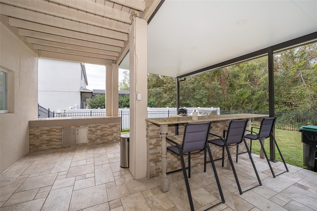 view of patio / terrace with a bar