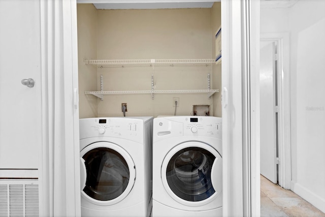 laundry area featuring separate washer and dryer