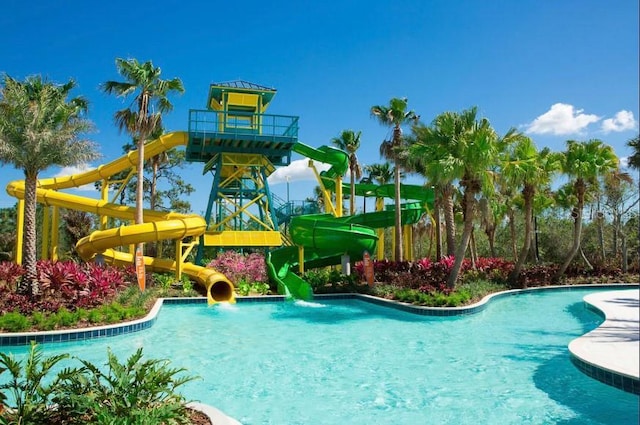 view of pool featuring a water slide