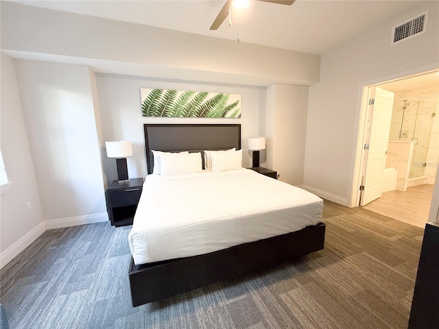 bedroom featuring ensuite bathroom, ceiling fan, and carpet flooring