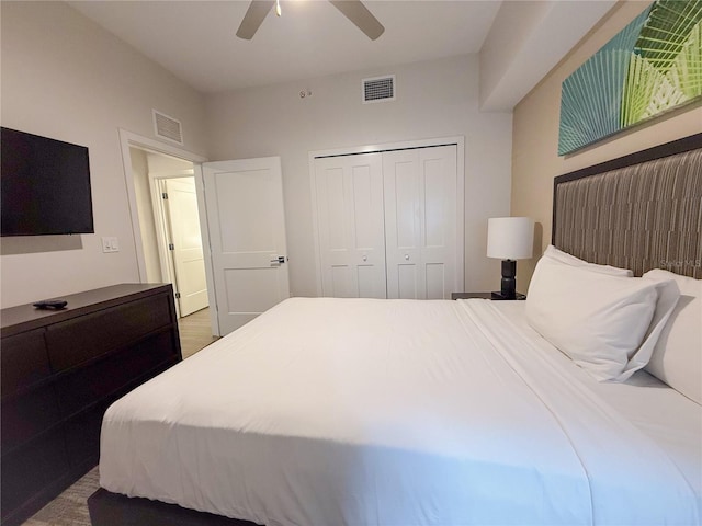 bedroom featuring ceiling fan and a closet