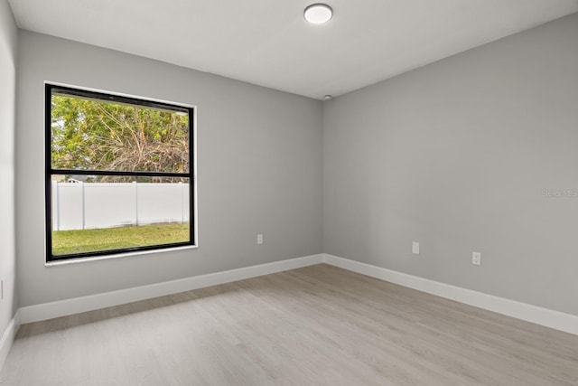 empty room with light wood-type flooring