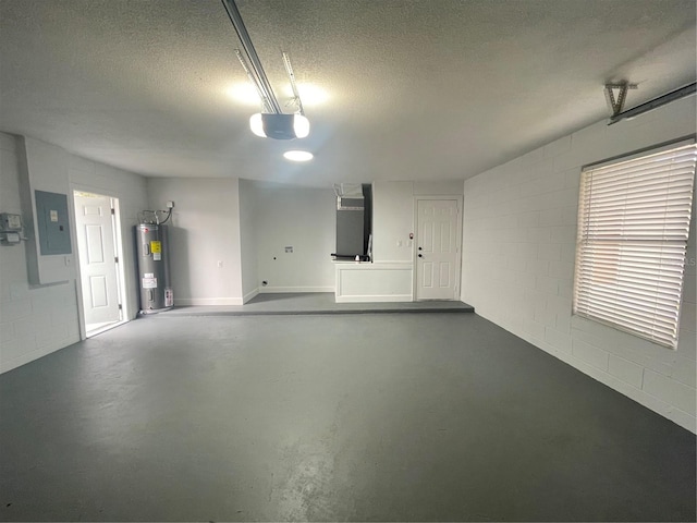 202 Cobalt Dr, Kissimmee, FL 34758 - garage featuring electric water heater, concrete block wall, electric panel, a garage door opener, and heating unit
