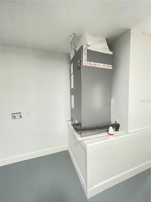 202 Cobalt Dr, Kissimmee, FL 34758 - detailed view of baseboards and a textured ceiling