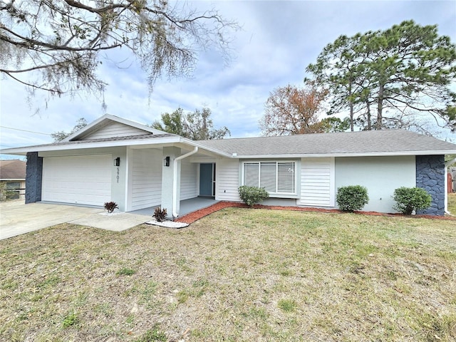 ranch-style home with a front yard and a garage