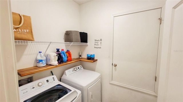 washroom with independent washer and dryer