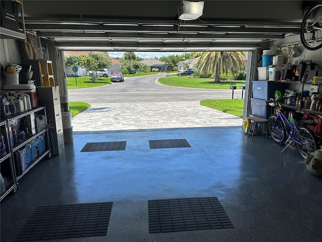 garage featuring a garage door opener