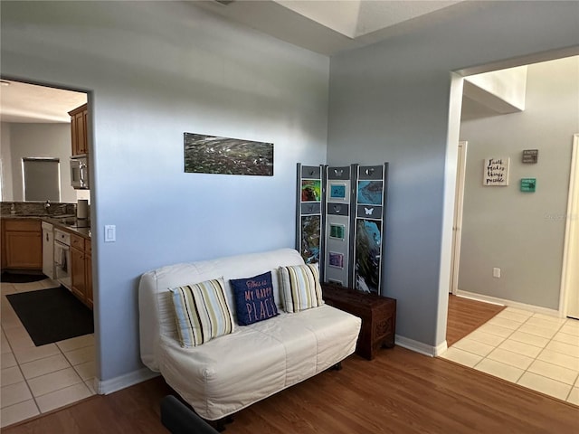 sitting room with light tile patterned floors