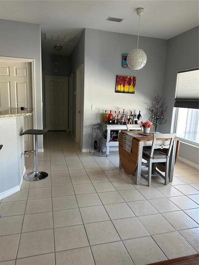 view of tiled dining area