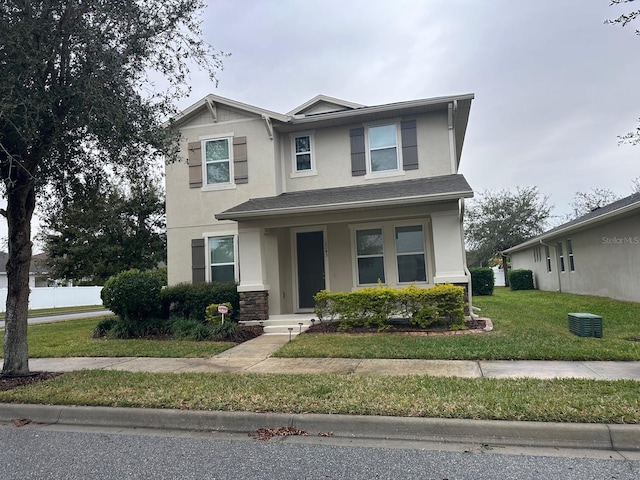 view of front of house with a front lawn