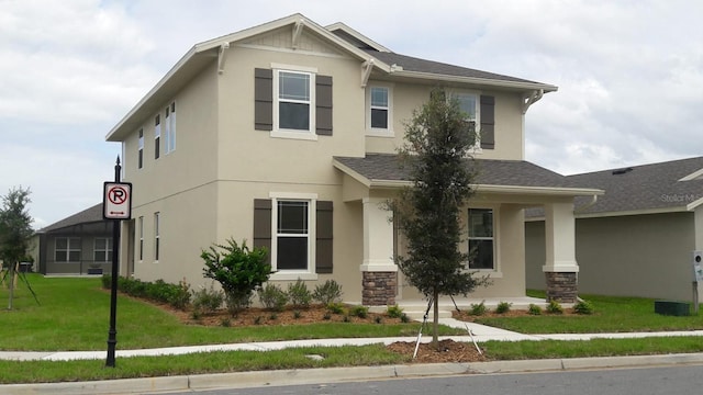 view of front facade with a front yard