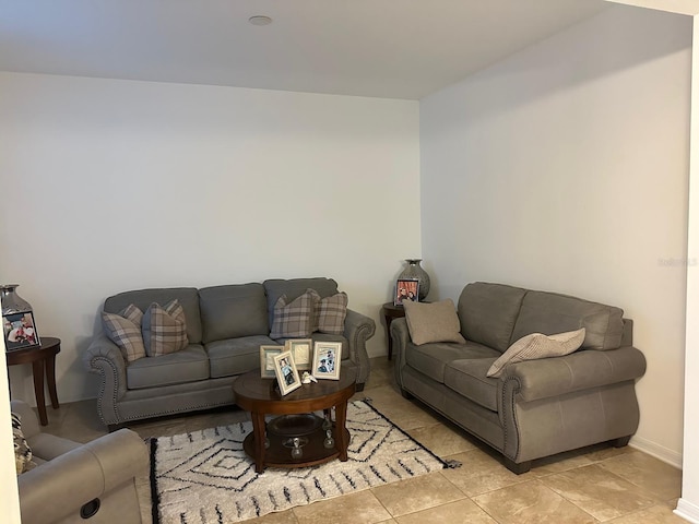 living room with light tile patterned flooring