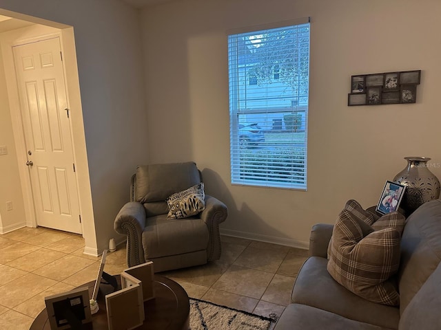 living room with light tile patterned flooring