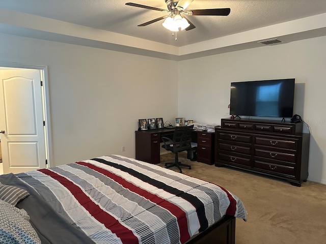 bedroom featuring ceiling fan and light colored carpet