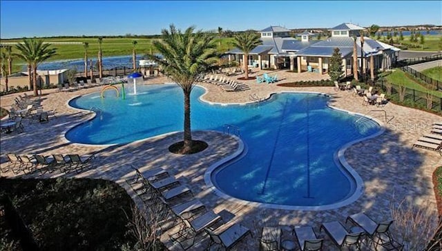 view of pool featuring a patio