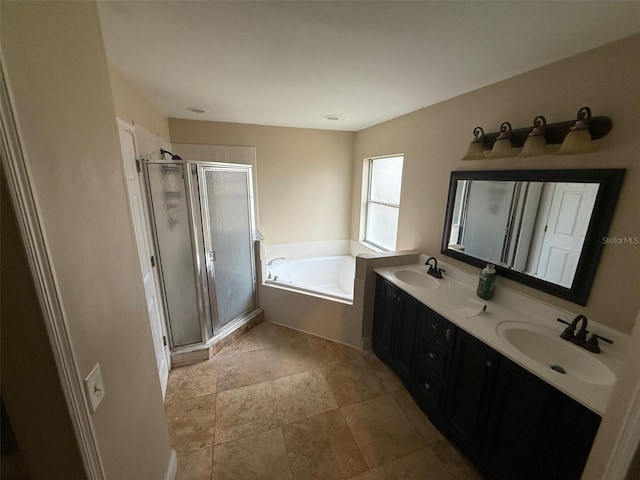 bathroom with shower with separate bathtub and vanity