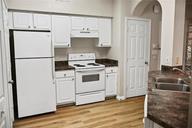 kitchen with white cabinets, sink, white appliances, and light hardwood / wood-style floors