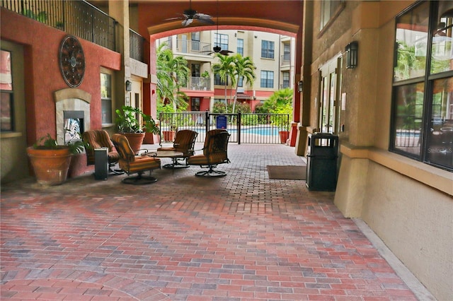 view of patio / terrace featuring ceiling fan