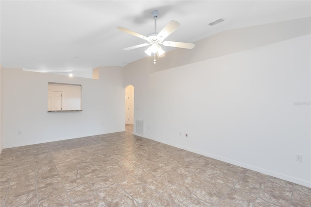 spare room with ceiling fan and lofted ceiling