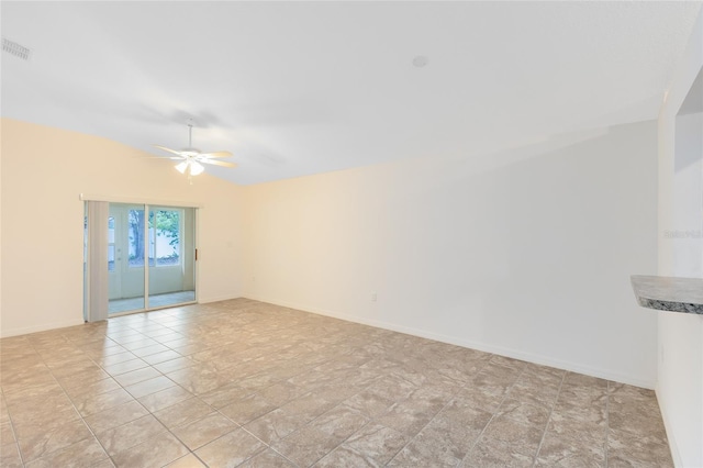 unfurnished room with ceiling fan and light tile patterned flooring