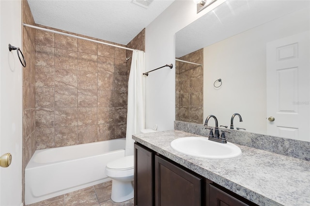 full bathroom with toilet, a textured ceiling, vanity, and shower / tub combo with curtain