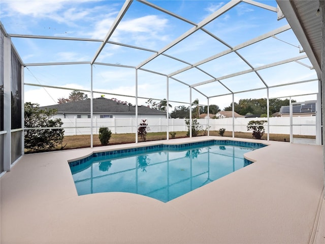 view of pool featuring a lanai and a patio area